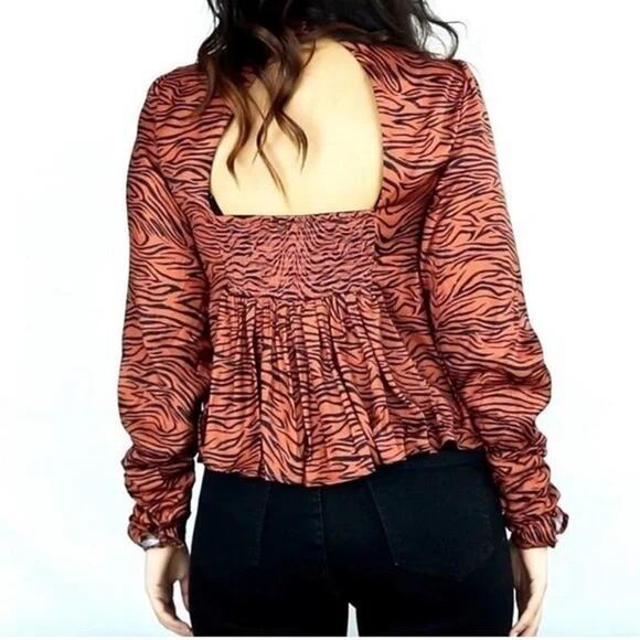 Free People | Tiger Open Back Cut-Out Flouncy Peplum Smocked Long Sleeve Top - Picture 2 of 11